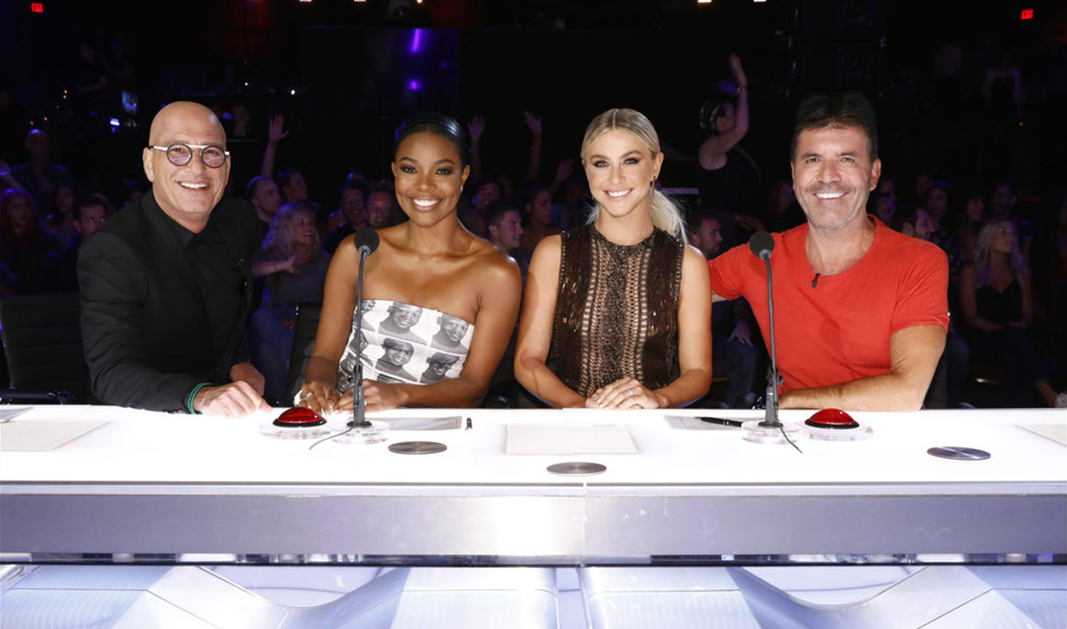 This image released by NBC shows celebrity judges, from left, Howie Mandel, Gabrielle Union, Julianne Hough, Simon Cowell on the set of "America's Got Talent," in Los Angeles. Union is thanking supporters for defending her amid reports she was fired from “America’s Got Talent” after complaining about racism and other on-set issues. Without directly addressing her status with NBC’s talent show, the actress tweeted that the backing helped overcome feeling of being lost and alone. (Trae Patton/NBC via AP)