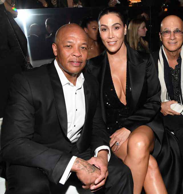 Dr. Dre & Nicole Young. | Source: Kevin Mazur / Getty