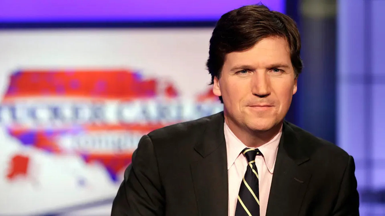 Tucker Carlson, then host of “Tucker Carlson Tonight,” poses for photos in a Fox News Channel studio in New York City on March 2, 2017. (RICHARD DREW/AP PHOTO)